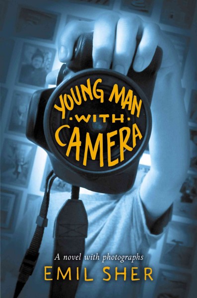 Young man with camera / by Emil Sher ; photographs by David Wyman.