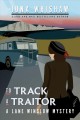 To Track a Traitor : Lane Winslow Mystery Cover Image